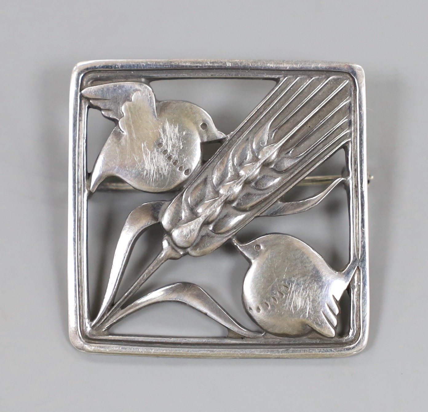 A Georg Jensen sterling square 'Robin and frond' brooch, no. 250, 36mm.